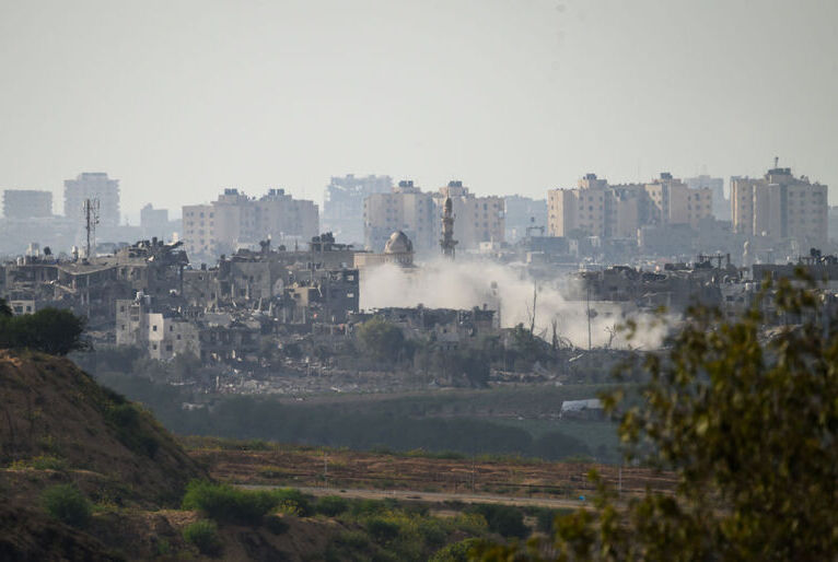 SDEROT, ISRAEL - OCTOBER 19: A plume of smoke rises following an artillery strike within Gaza on October 19, 2023, as seen from Sderot, Israel. As Israel prepares to invade the Gaza Strip in its campaign to vanquish Hamas, the Palestinian militant group that launched a deadly attack in southern Israel on October 7th, worries are growing of a wider war with multiple fronts, including at the country's northern border with Lebanon. Countries have scrambled to evacuate their citizens from Israel, and Israel has begun relocating residents some communities on its northern border. Meanwhile, hundreds of thousands of residents of northern Gaza have fled to the southern part of the territory, following Israel's vow to launch a ground invasion. (Photo by Leon Neal/Getty Images)